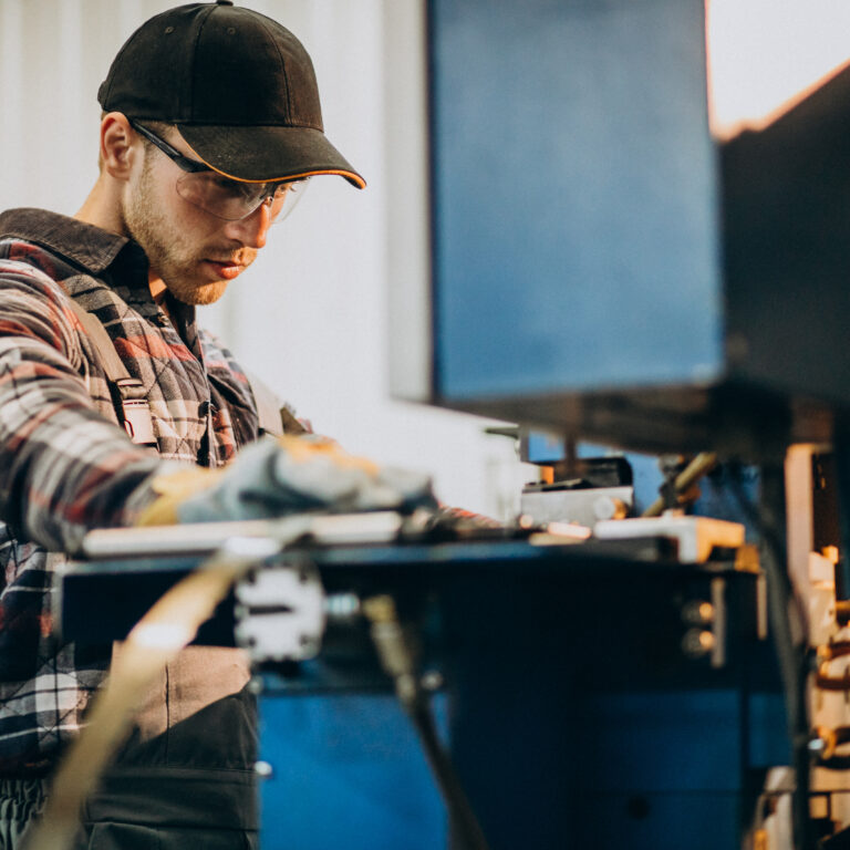 Man working on steel fatory and equipment for steel production